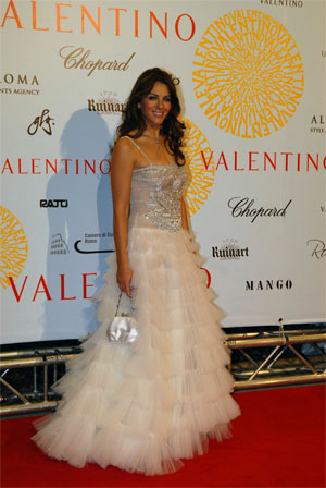 Illustration for article titled Elizabeth Hurley + Valentino = Does This Woman Age?